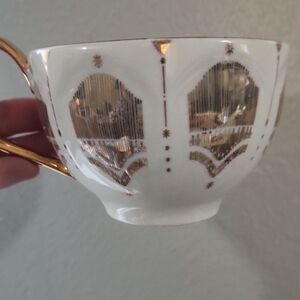 Anthropologie Michelle Mug , very pretty gold and white art deco !